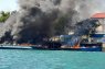 Four boats burst into flames at Batam pier