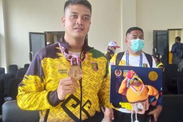 Pertama Ikut PON, Wira Merebut Emas Menembak