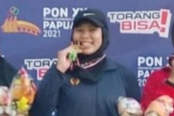 Dilanda Cedera, Tresna Raih Emas Lempar Cakram